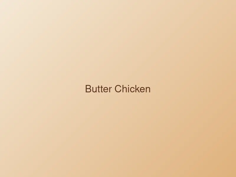 Butter chicken pieces in a rich creamy tomato gravy