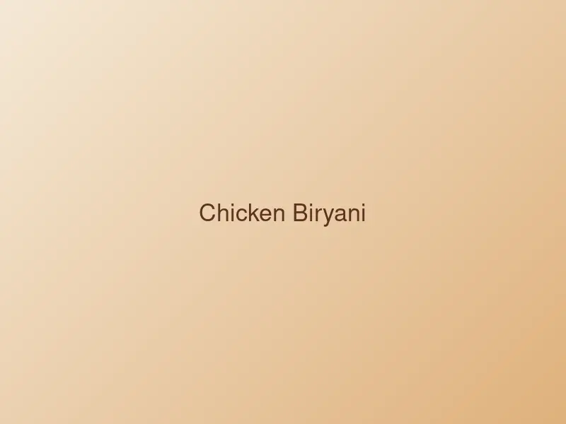 Chicken biryani with basmati rice, served with raita