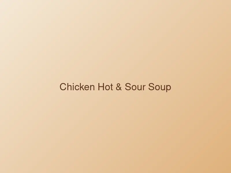 Steaming bowl of chicken hot and sour soup
