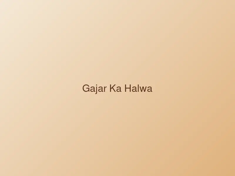 Bowl of gajar ka halwa garnished with nuts