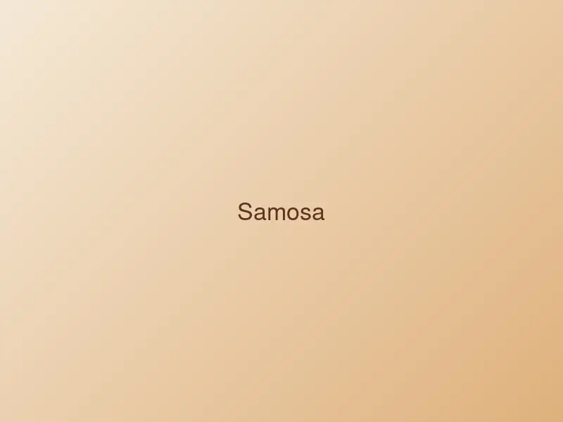 Two crisp golden samosas with spiced potato filling